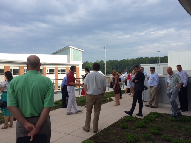 Hampton Roads Green Building Council Members tour the green roof overlooking the courtyard